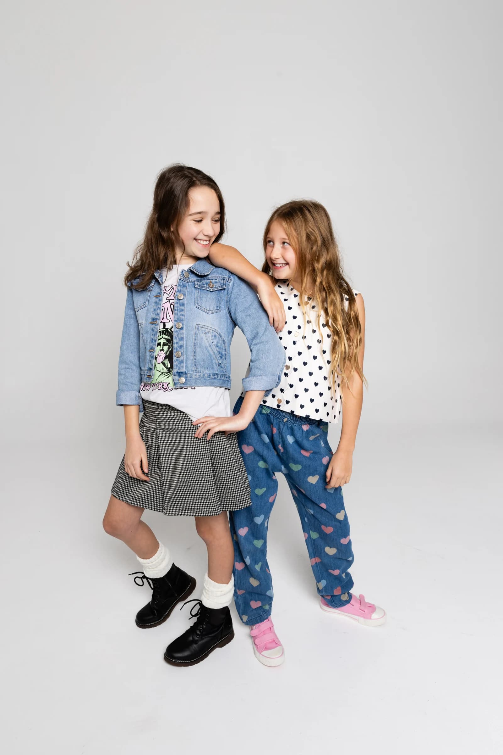 Two NVA young artists sharing a smile in the studio